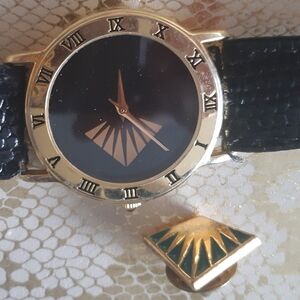 Greater Community Of Living Gold and Black Women's Watch.